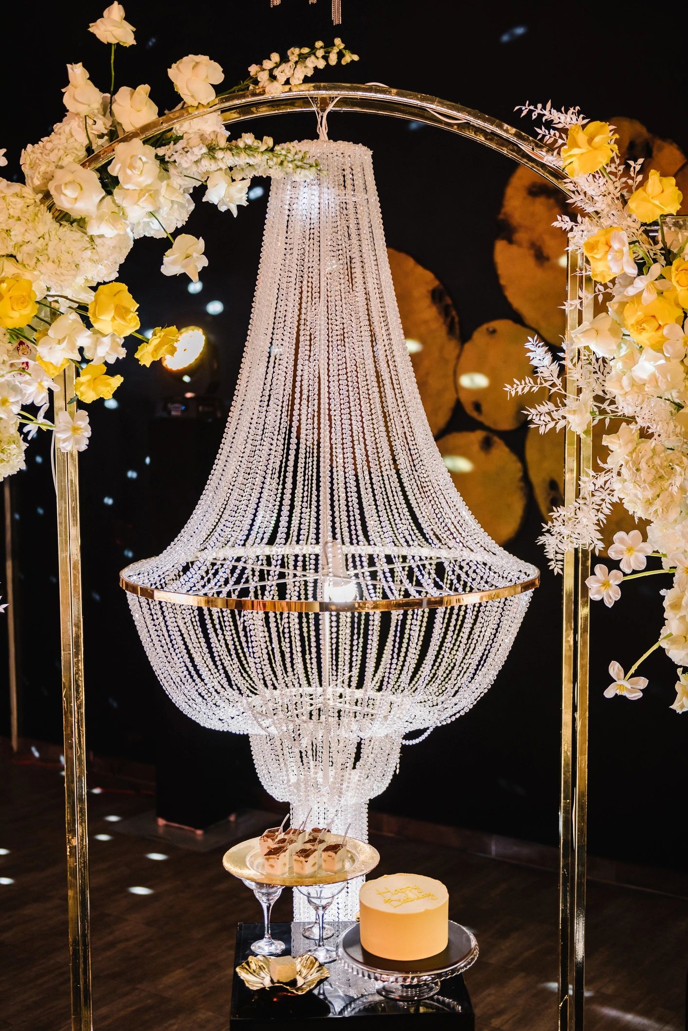 Luxury birthday celebration styling with elegant cake display and event decor