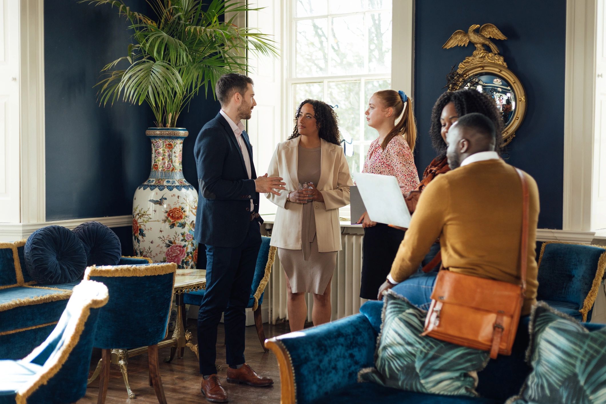 Professionals networking at a luxury corporate event