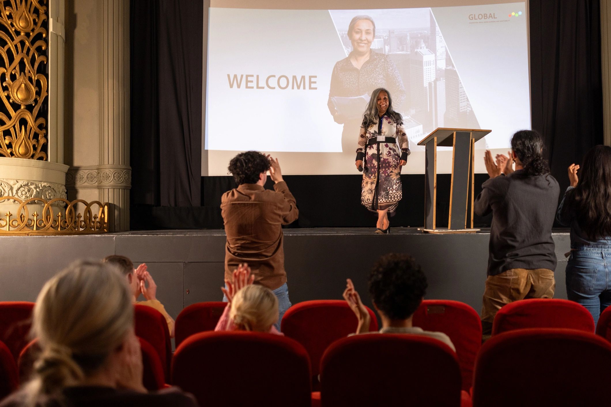 Audience applauding during a formal awards evening