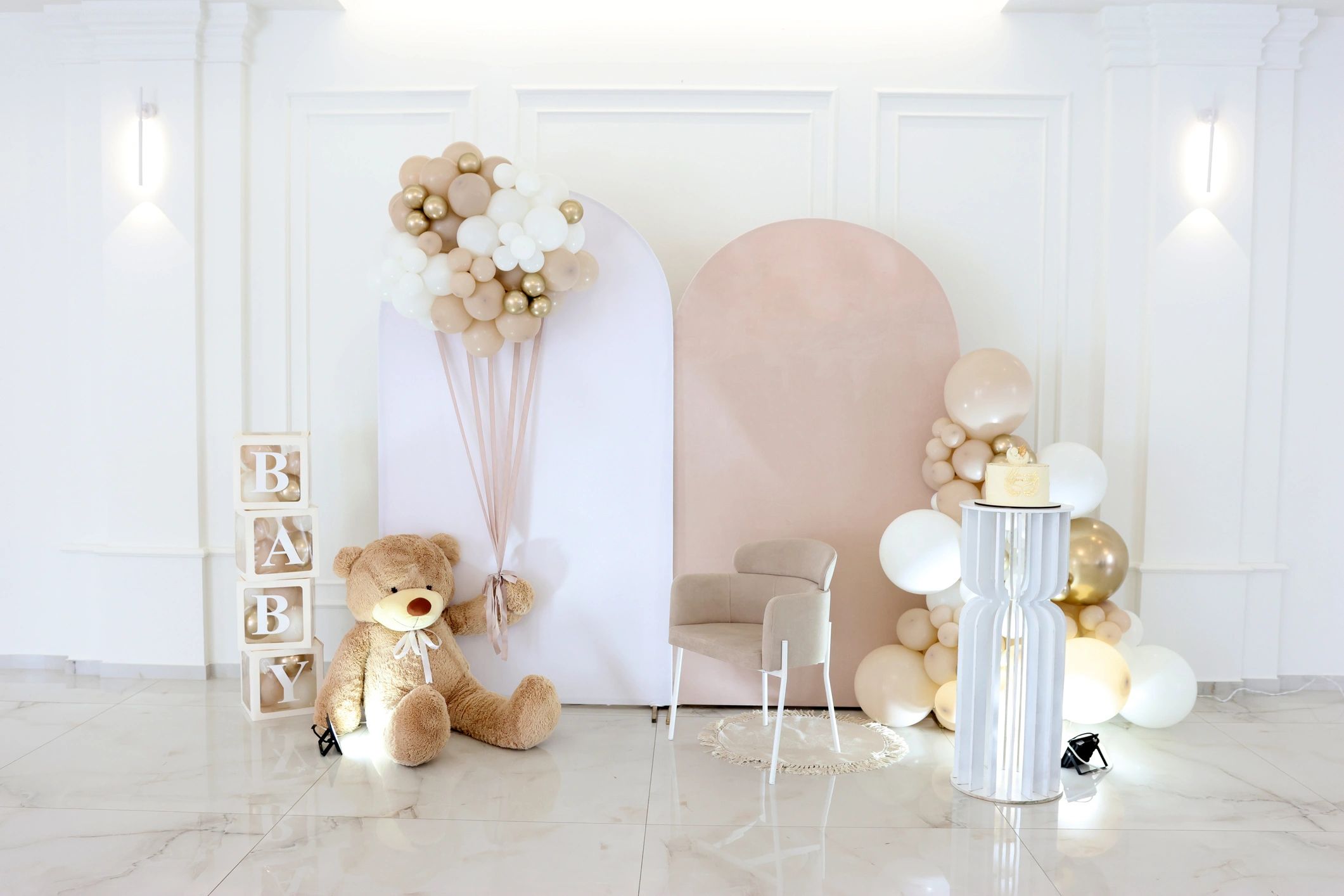 Baby shower display with teddy bear and balloon arrangement