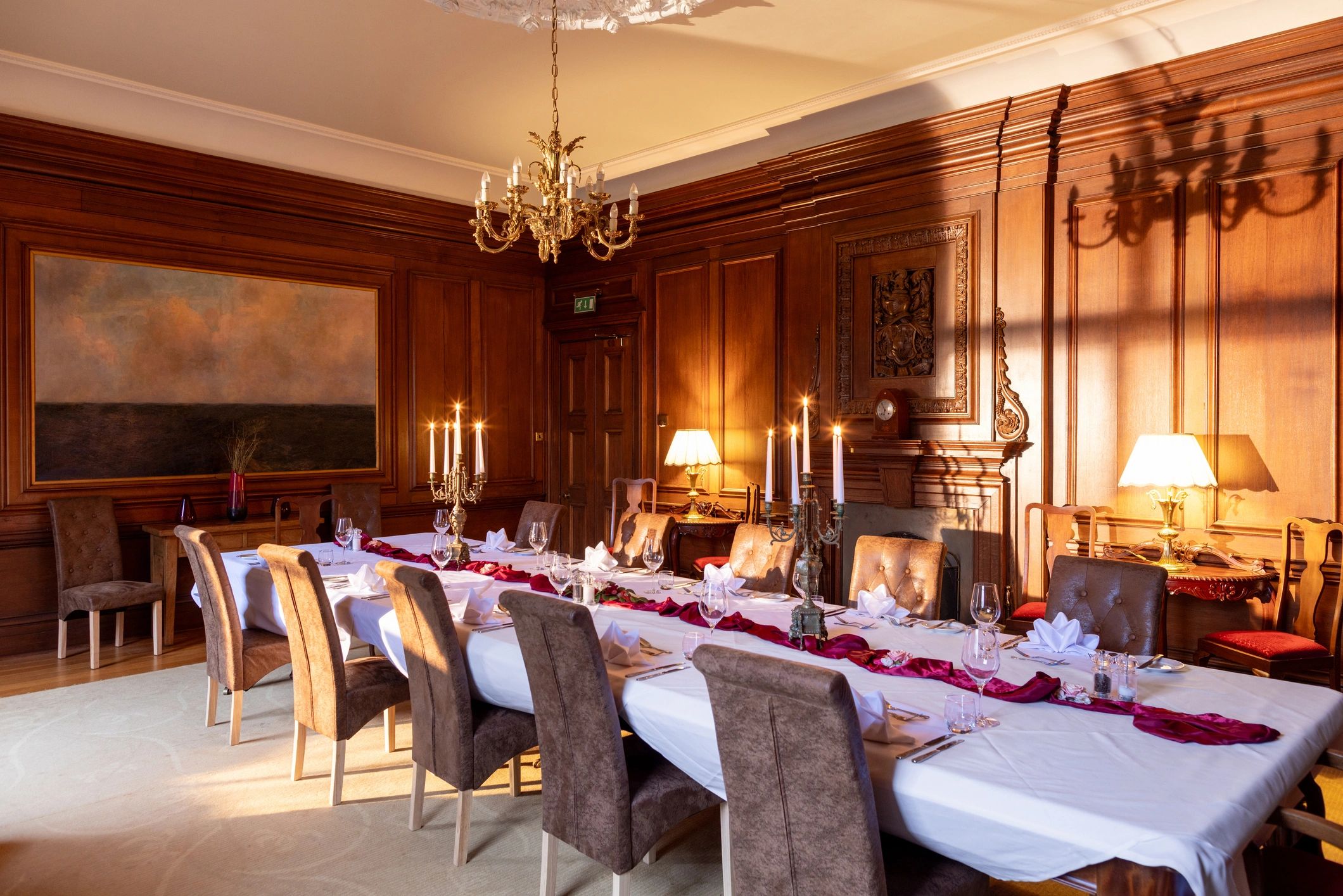 Luxury gala table setting with candlelight and glassware